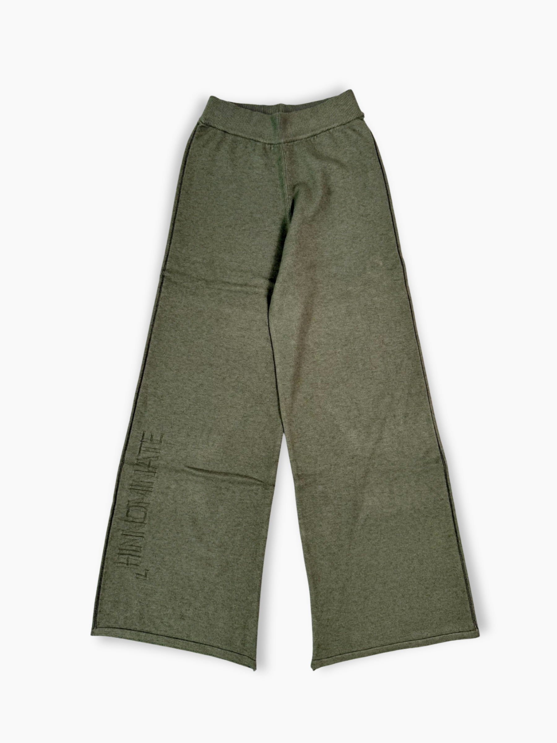 Pantaloni a palazzo in maglia verde con logo tono su tono ricamato sulla gamba