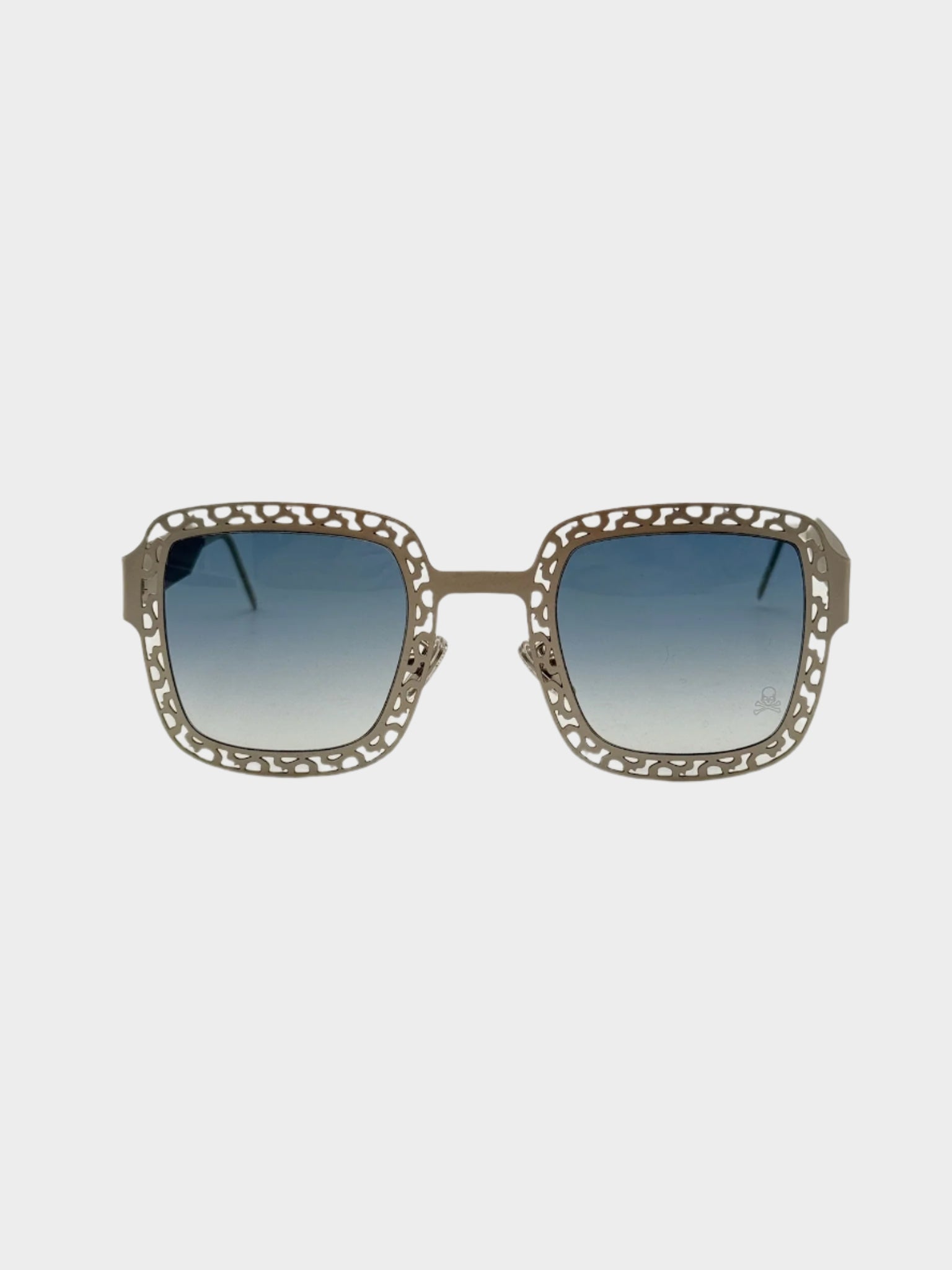 Vista frontale degli occhiali Philipp Plein squadrati oro chiaro con lenti blu