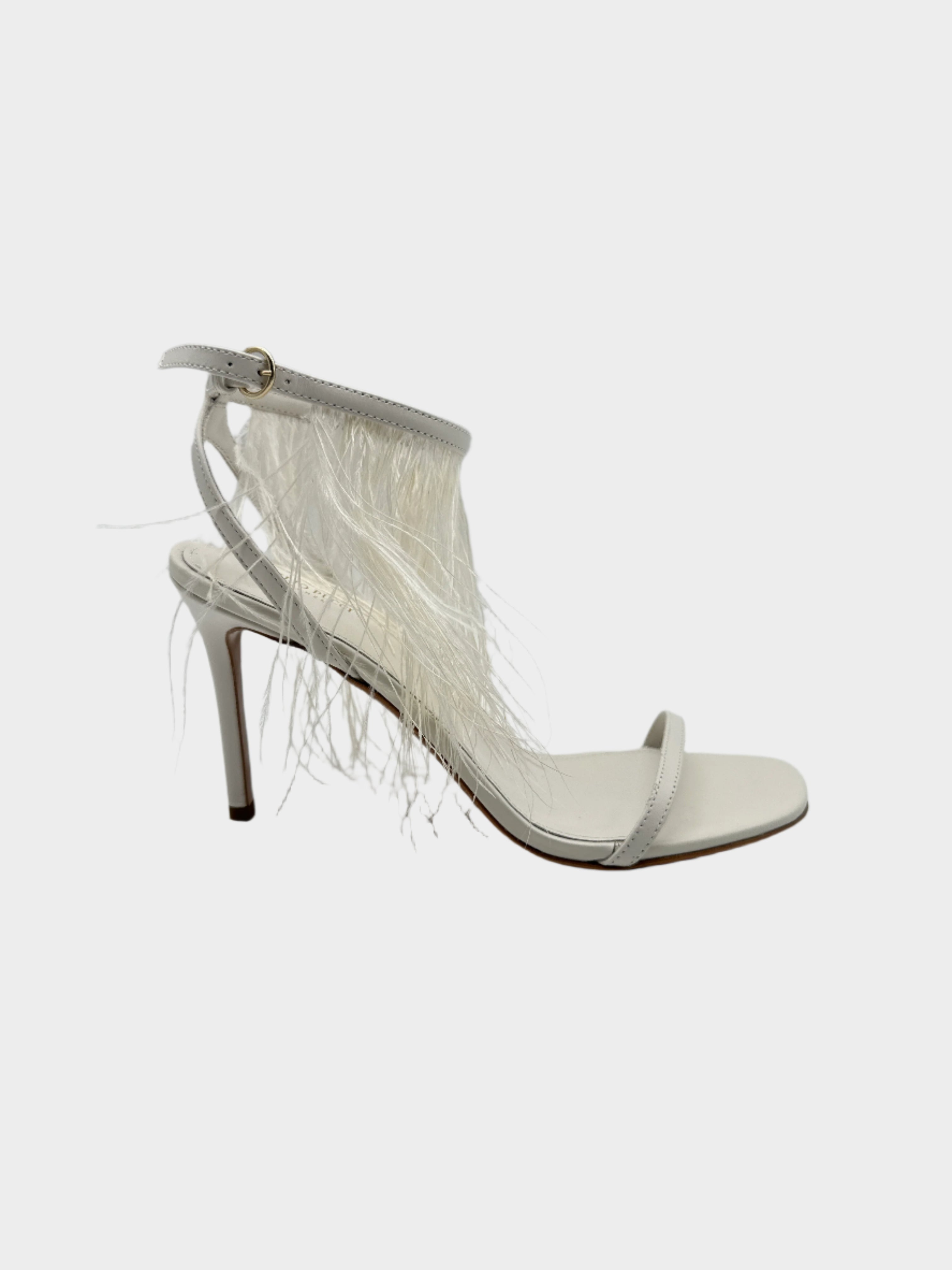 Sandali Emilio Pucci in pelle bianca con cinturino e frange di piume