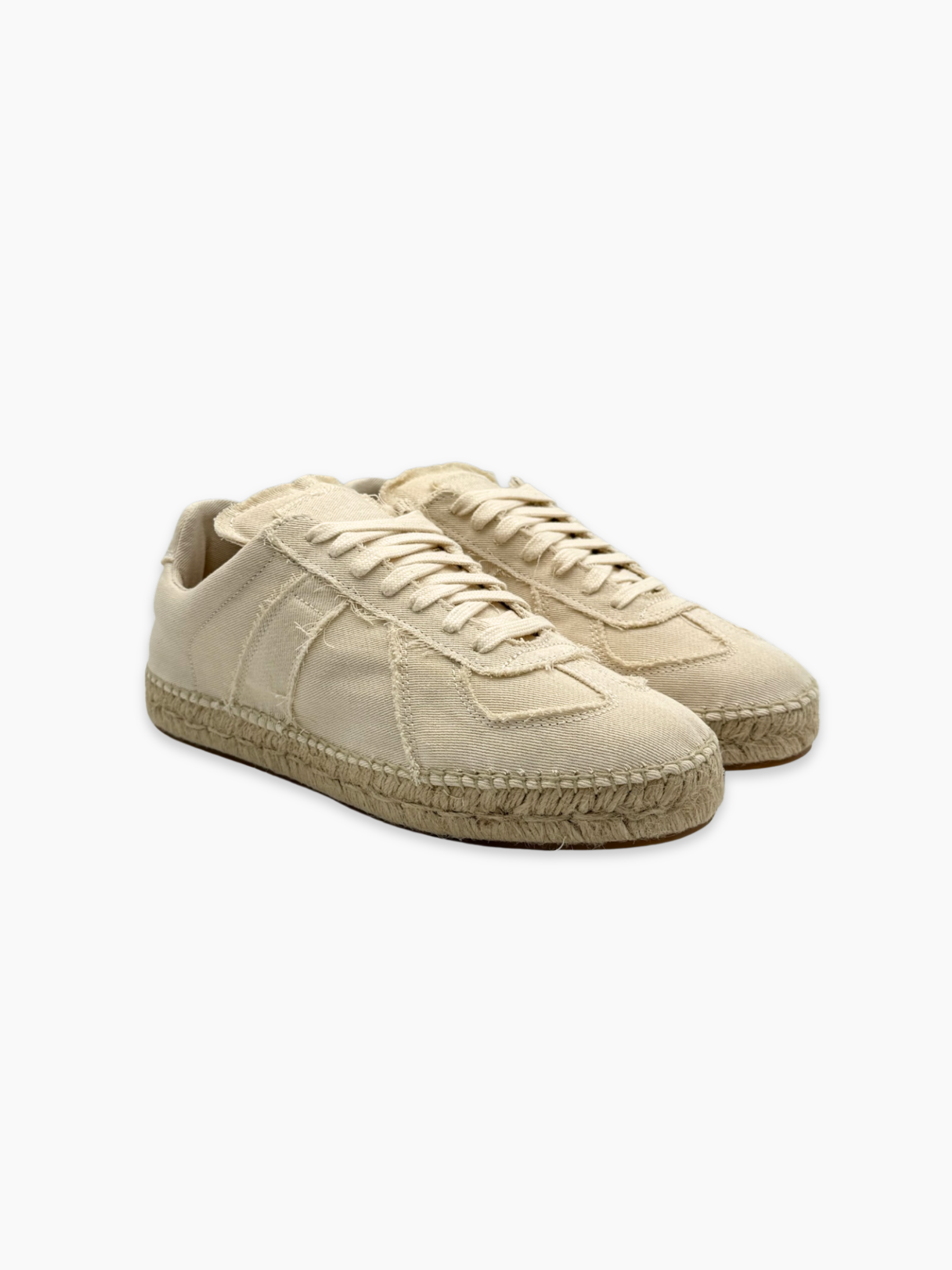 Sneakers Maison Margiela in tela beige con suola in corda viste laterali