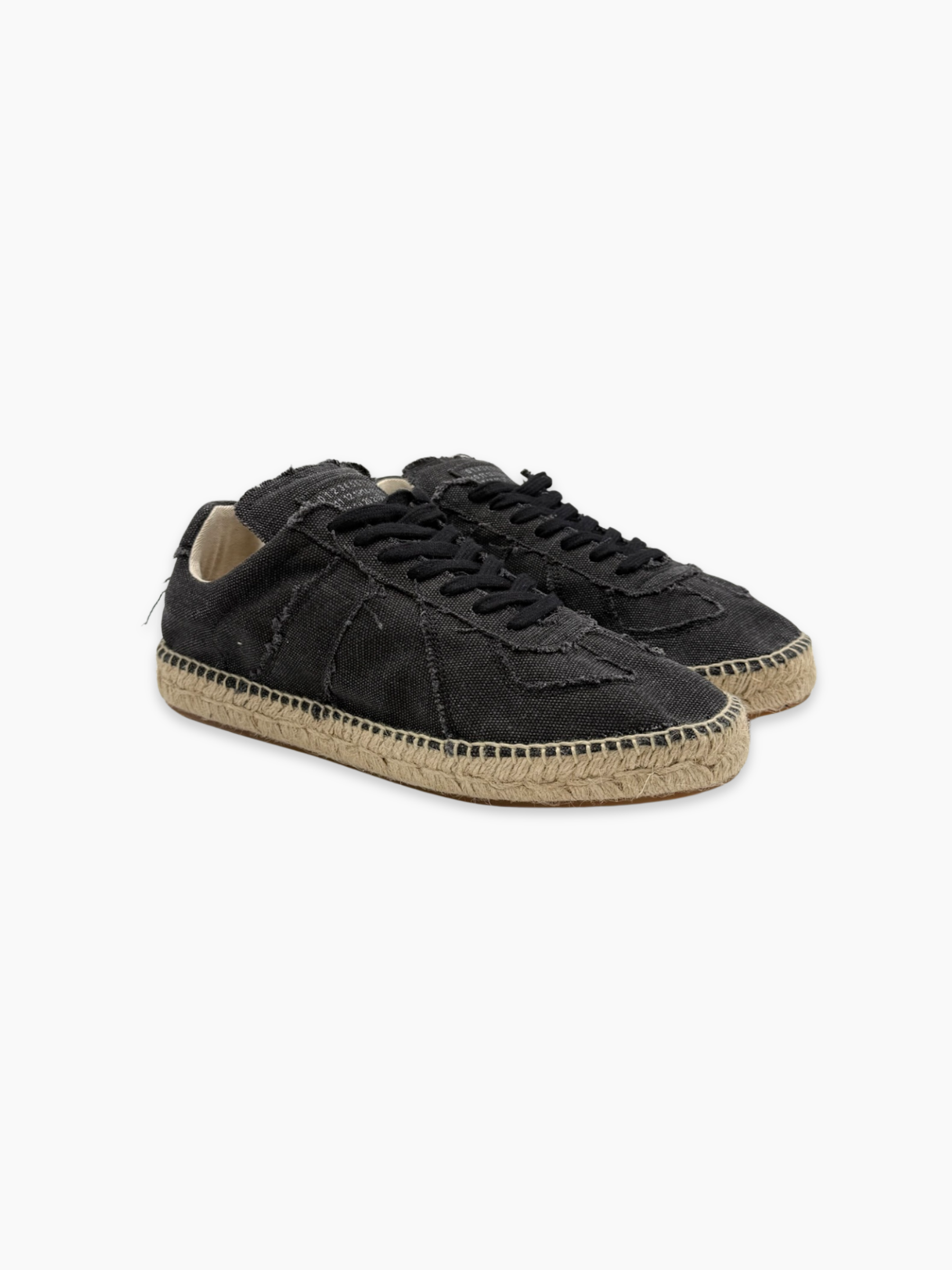 Sneakers Maison Margiela in tela nera con suola in corda viste laterali