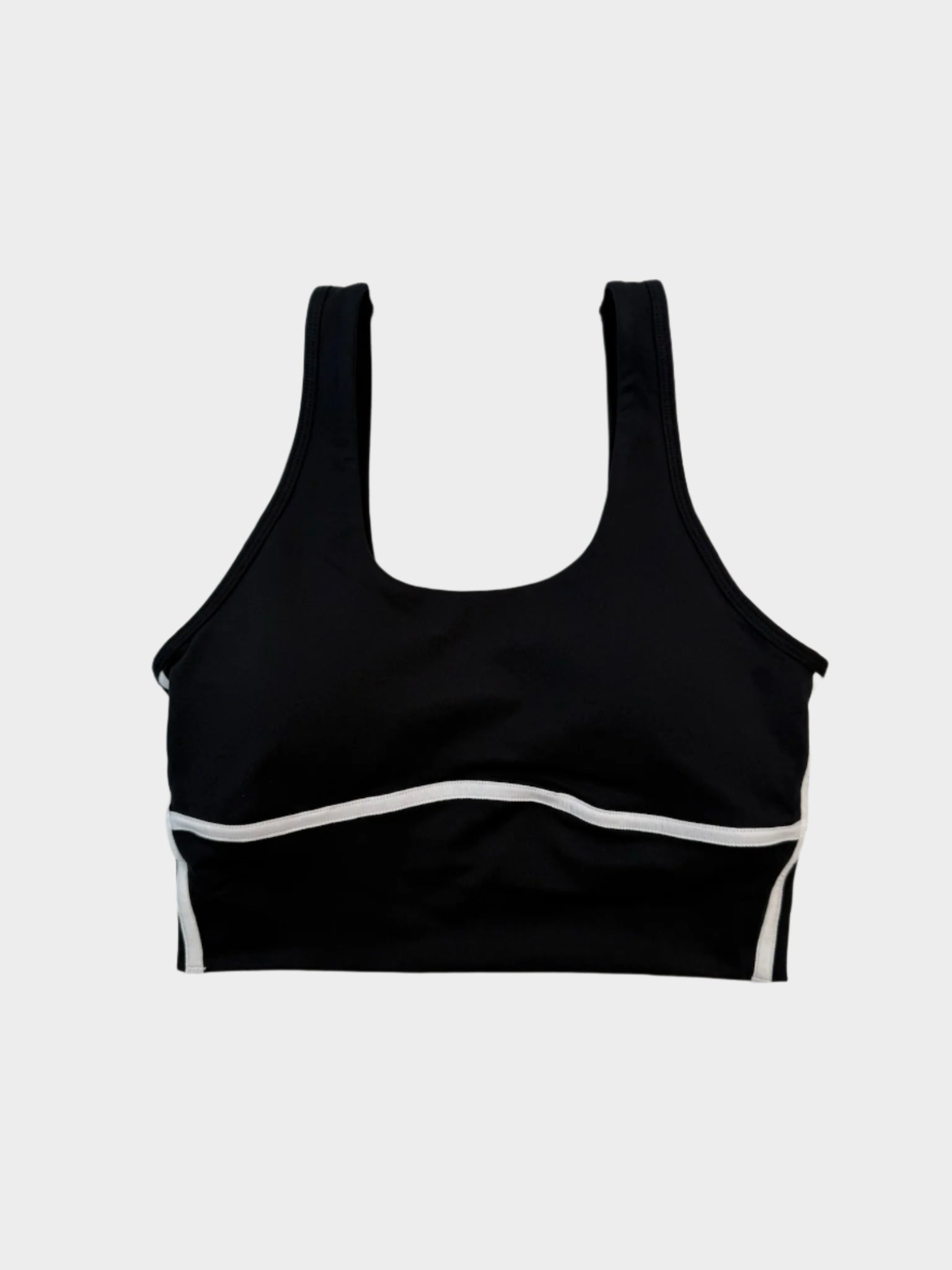 tank top nero crop, top sportivo donna, tank tecnico con piping, top palestra aderente, tank top traspirante donna