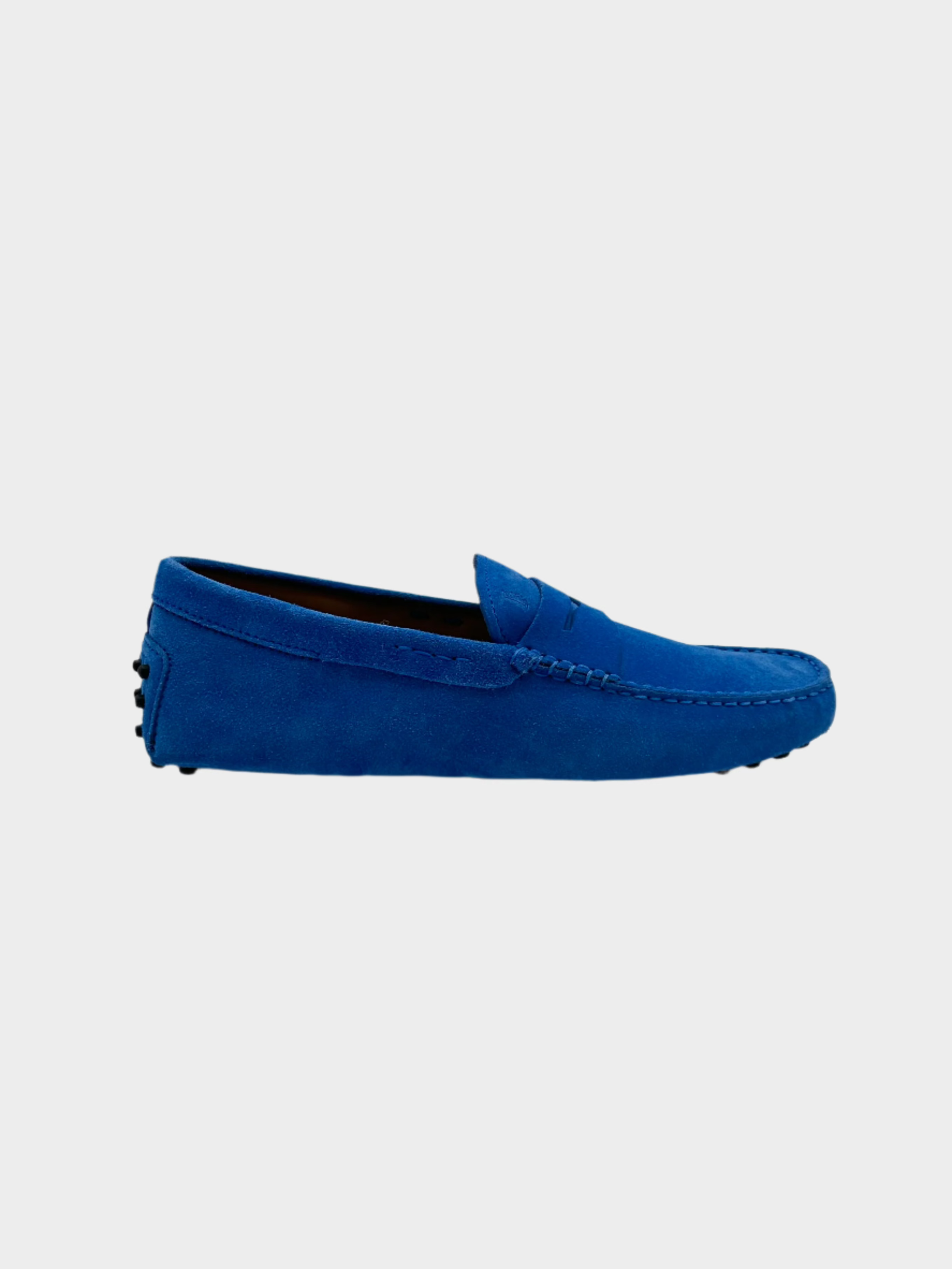 Mocassino Tod's in pelle scamosciata bluette chiaro con gommini, vista laterale