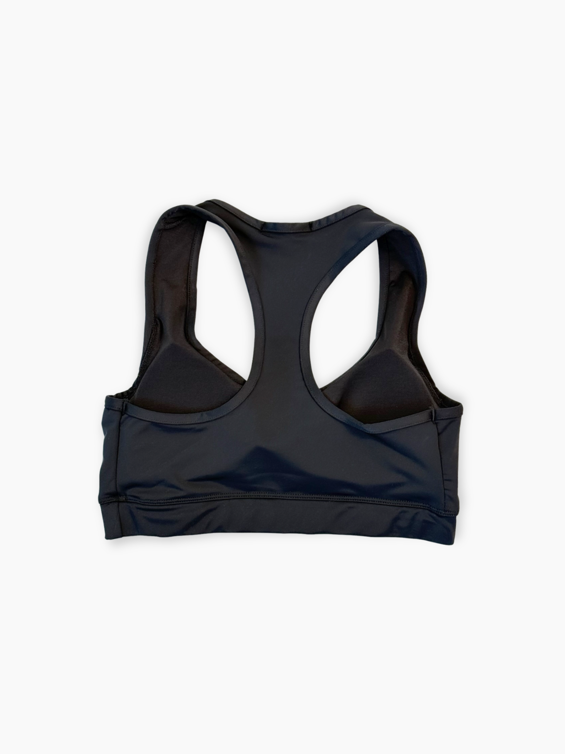 Dettaglio fascia elastica logata del top sportivo nero Hinnominate